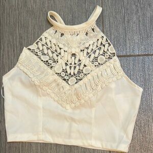 Well, made top zipper back size small by rumor never worn can be worn alone